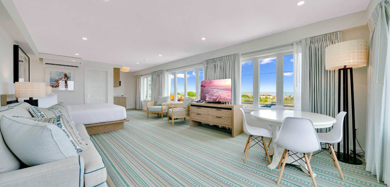 Oceanview King Suite with Kitchenette and Bathroom with Glass Shower at Cape May's Newest Beachfront Hotel - Mahalo Cape May, NJ