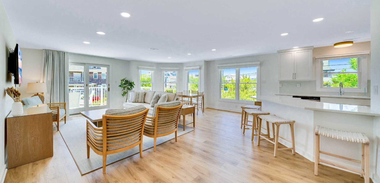 Open living dining and kitchen space. Luxury 3 br 2.5 bath summer rental in Cape May sleeps up to 10 at Mahalo - Cape May's Newest Beachfront Hotel. Perks of a hotel with the comfort of a summer house rental in Cape May, NJ.