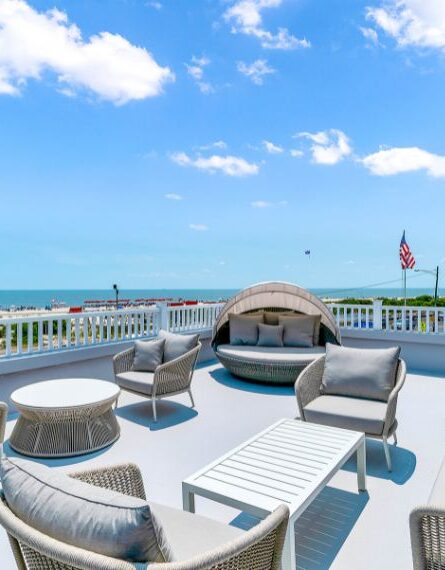 3rd floor ocean view sundeck with lounge furniture at our resort in Cape May