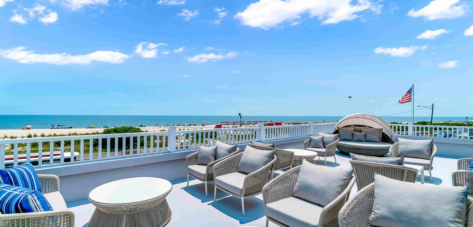 Sun deck with lounge chairs overlooking the ocean at our Cape May resort