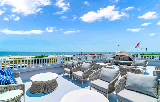 Sun deck with lounge chairs overlooking the ocean at our Cape May resort