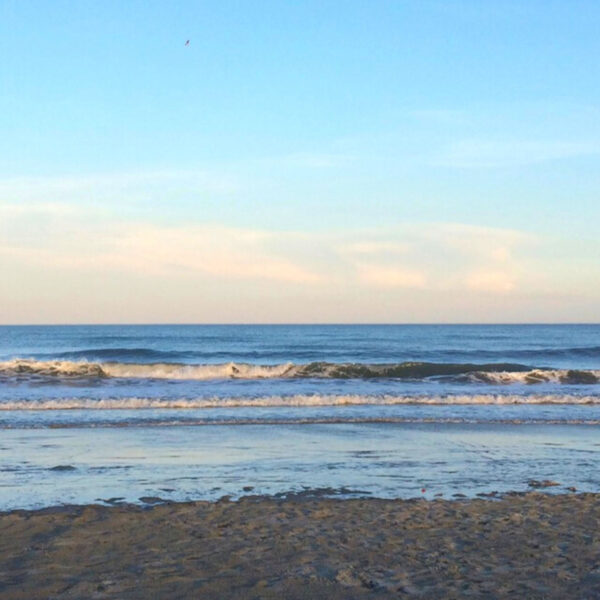 Tide rolling in on a beautiful beach near our Wildwood Crest hotel