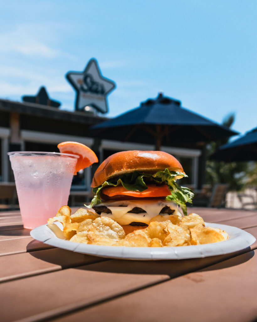 Burger with chips and a grapefruit cocktail at the Star Beach Bar Wildwood Crest dining