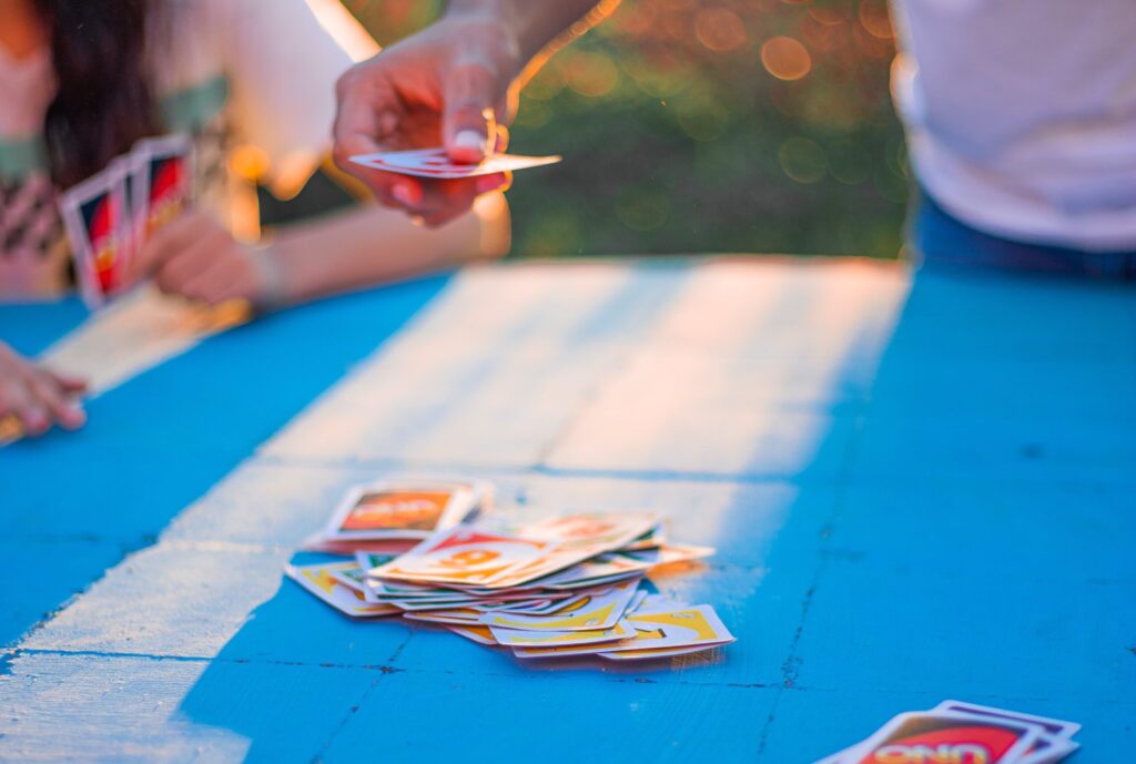 Family playing Uno at Mahalo Cape May