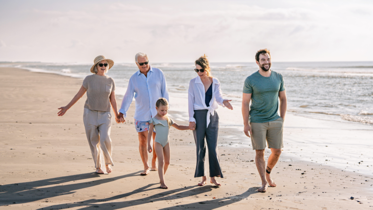 Family walking on the beach