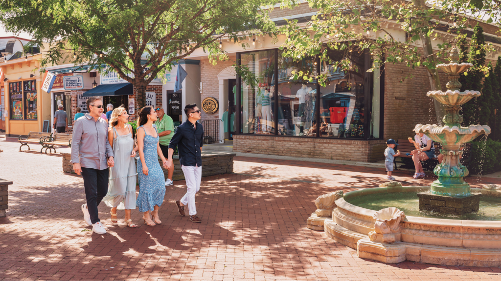 Family walking in Washington Street Mall