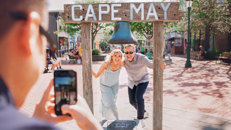 Couple posing for a photo at the Washington Street Mall in Cape May