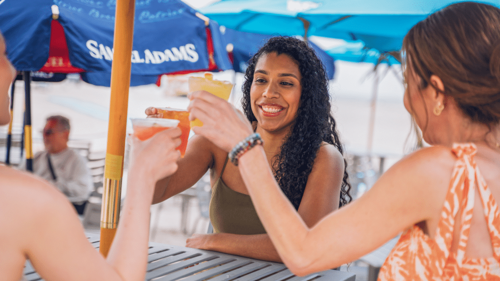 Friends toasting at Star Beach Bar