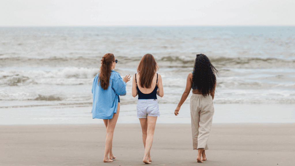 Three women walking on the beach in Wildwood