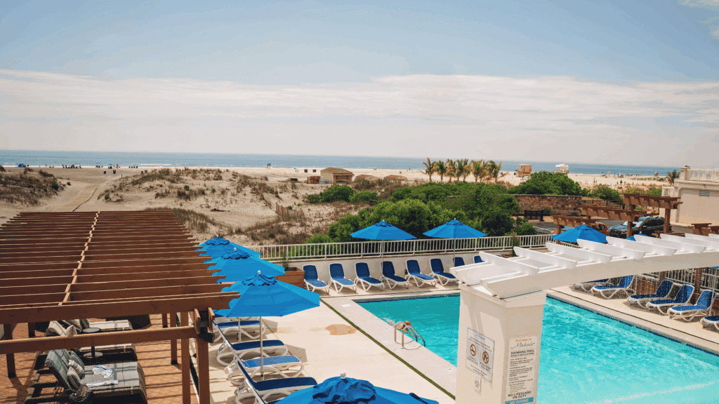 View of the pool and Wildwood beach from a Mahalo Diamond Beach resort balcony
